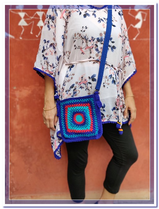 Ladies Flower print Poncho style top Model with Crochect Bag