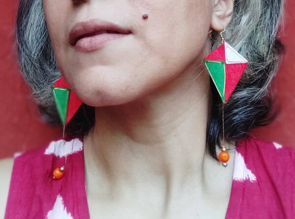 Kite Dangler Earrings in tricolor shades on model