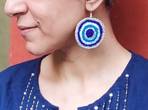 Evil Eye Hoop earrings in Turq Blue and Silver Side View Amaryn SVATANYA handcrafted by underprivileged women